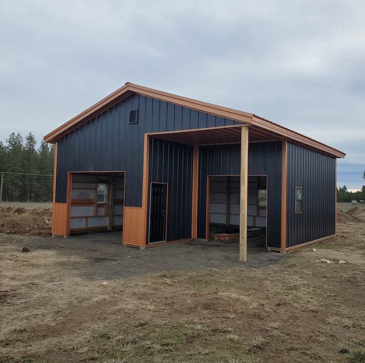 Black and copper pole building constructed by A & D Contractors LLC